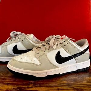 ￼Nike Women’s Dunk Low “Light Iron Ore Black”